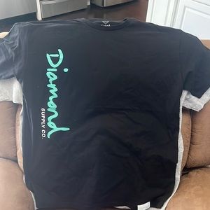 Diamond supply tee shirt.